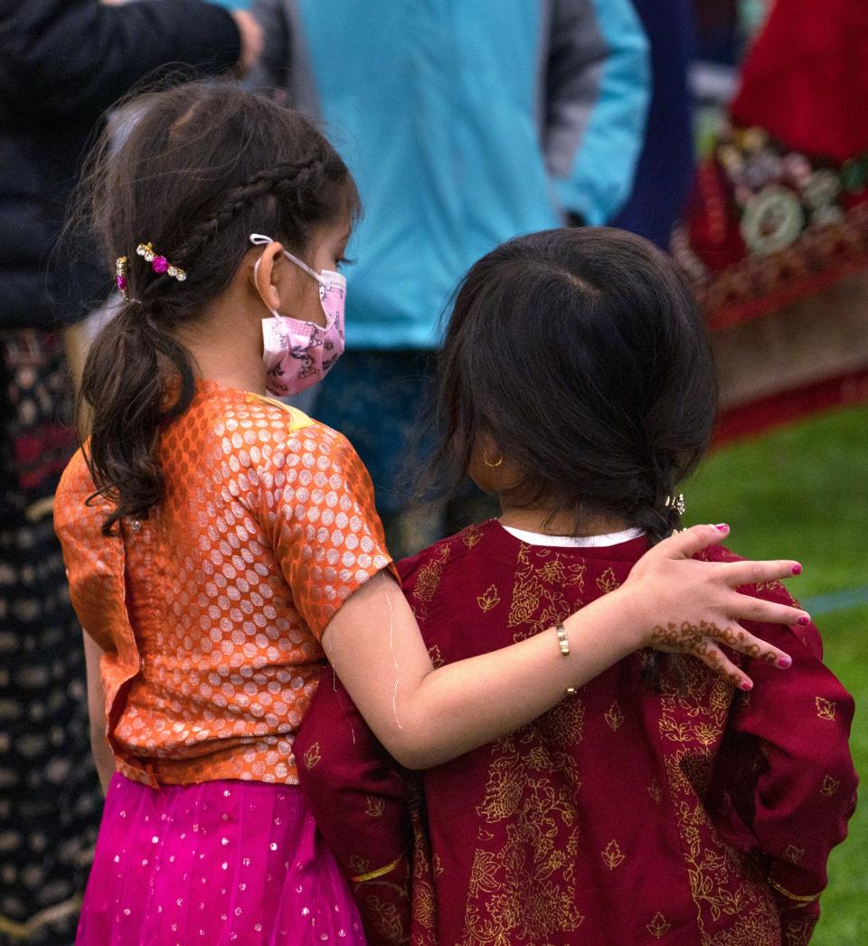 People of all ages come together during the Eid Al-Fitr celebration after prayers Monday, May 2, 2022 at the Grand Park Sports Complex Events Center in Westfield. Prayers started the day as the Indiana Muslim community celebrated the end of the month-long dawn-to-sunset fasting of Ramadan.