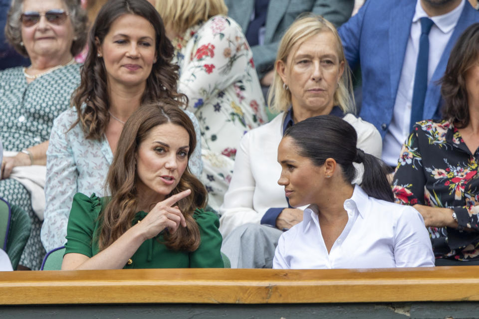 LONDON, ENGLAND - July 13:   Catherine, Duchess of Cambridge and Meghan, Duchess of Sussex in the Royal Box on Centre Court during the Serena Williams of the United States match against Simona Halep of Romania during the Ladies Singles Final on Centre Court during the Wimbledon Lawn Tennis Championships at the All England Lawn Tennis and Croquet Club at Wimbledon on July 13, 2019 in London, England. (Photo by Tim Clayton/Corbis via Getty Images)