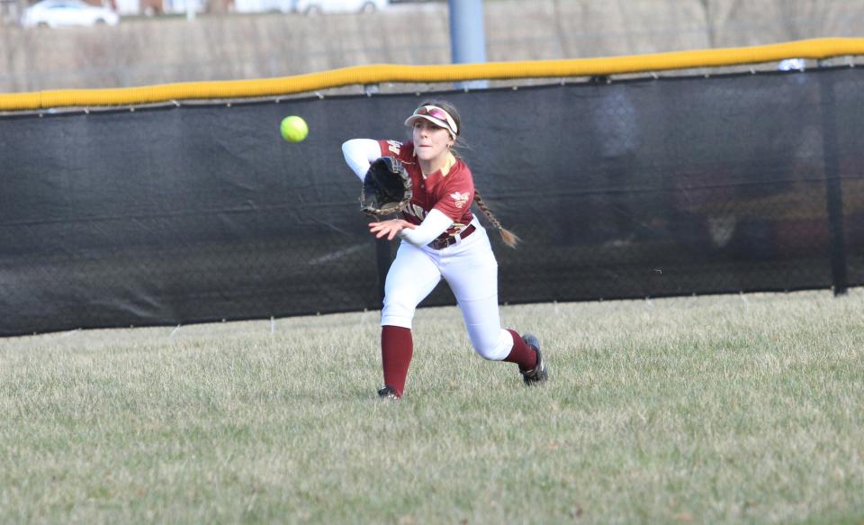 Licking Heights senior center fielder Kaylyn Hopf catches a line drive during a scrimmage against visiting Centerburg on Tuesday, March 21, 2023.