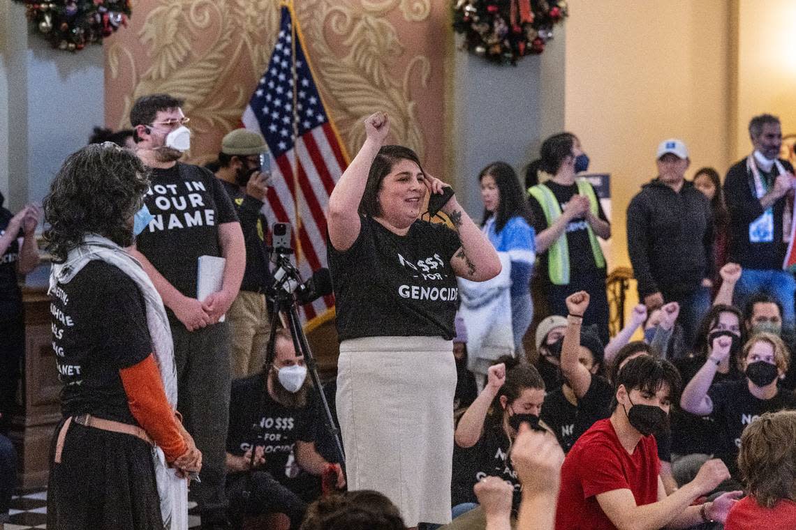 Sacramento City Councilwoman Katie Valenzuela speaks at a rally in the Capitol Rotunda on Wednesday as a group called for a cease-fire in the Israel-Hamas war after disrupting the first legislative session of the year. 