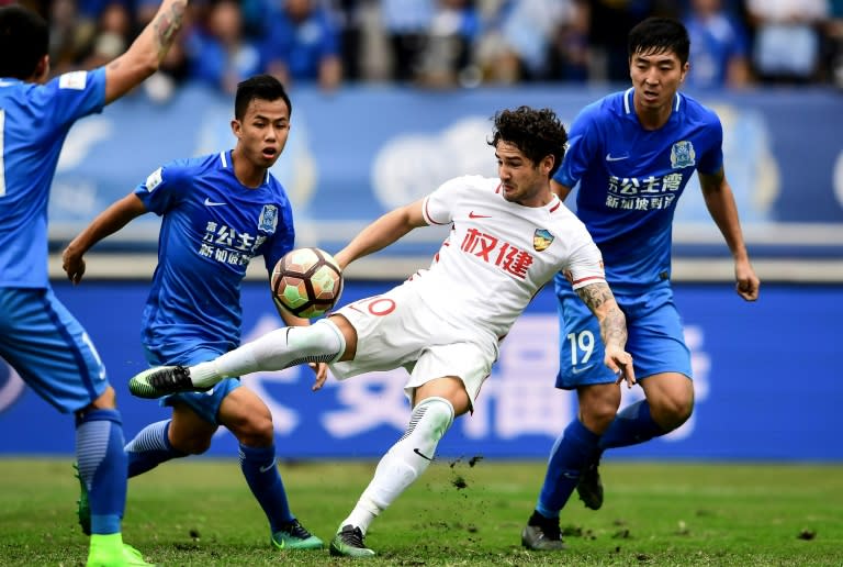 Striker Alexandre Pato (C) has re-discovered his love for football since signing for Tianjin Quanjian a year ago, sparking suggestions of a return to the Brazil team