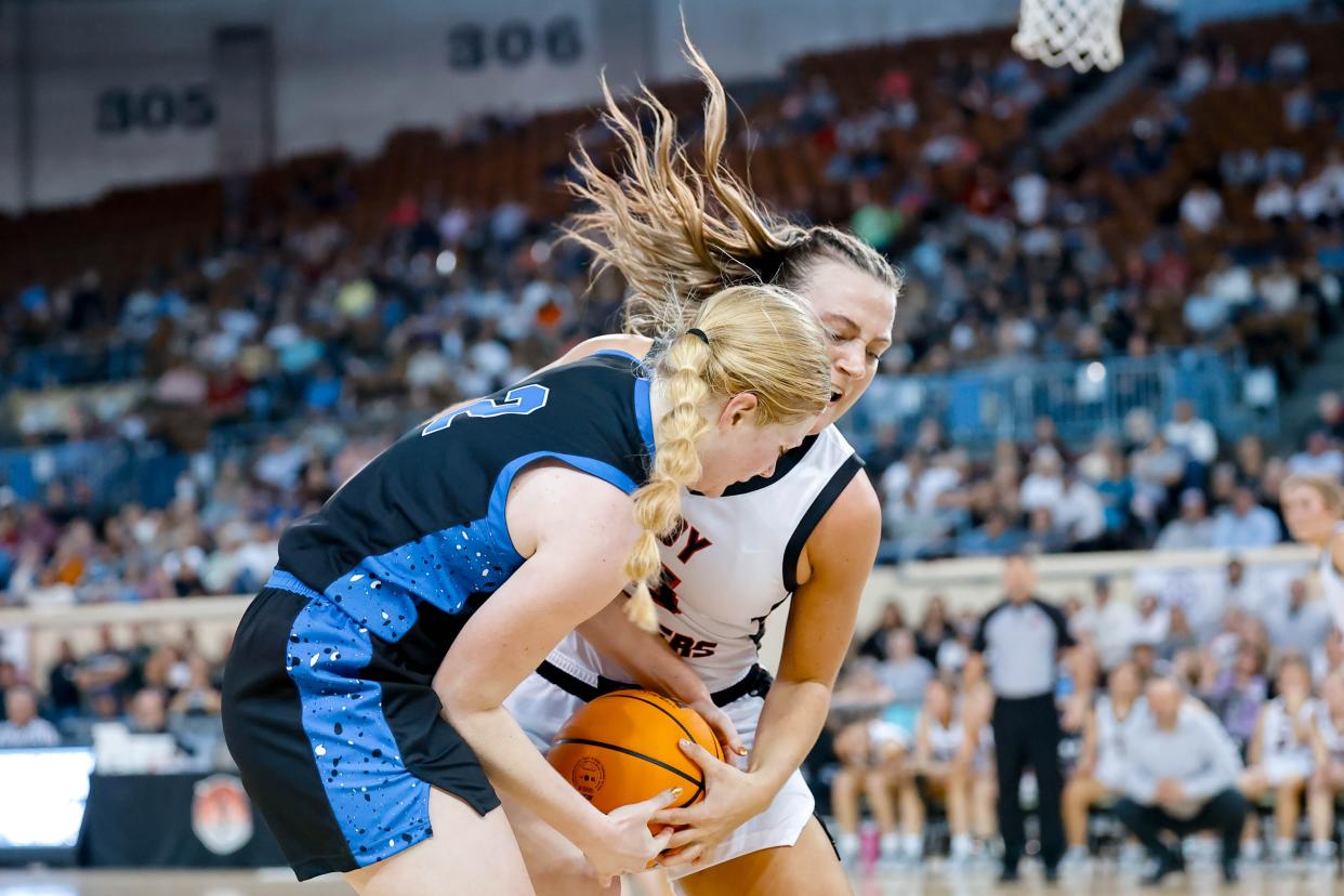 Lomega’s Abby Swart (2) and Lookeba-Sickles’ Ellie Willard (15) fight for control of the ball during the girls basketball Class B state championship game between Lomega and Lookeba-Sickles at Jim Norick Arena in Oklahoma City, on Saturday, March 2, 2024.