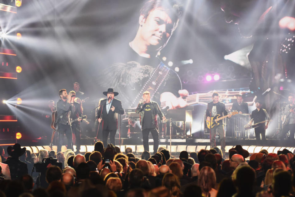 <p>Dierks Bentley, Eddie Montgomery, Gary LeVox, and Jay DeMarcus perform onstage at the 51st annual CMA Awards at the Bridgestone Arena on November 8, 2017 in Nashville, Tennessee. (Photo by Rick Diamond/Getty Images) </p>