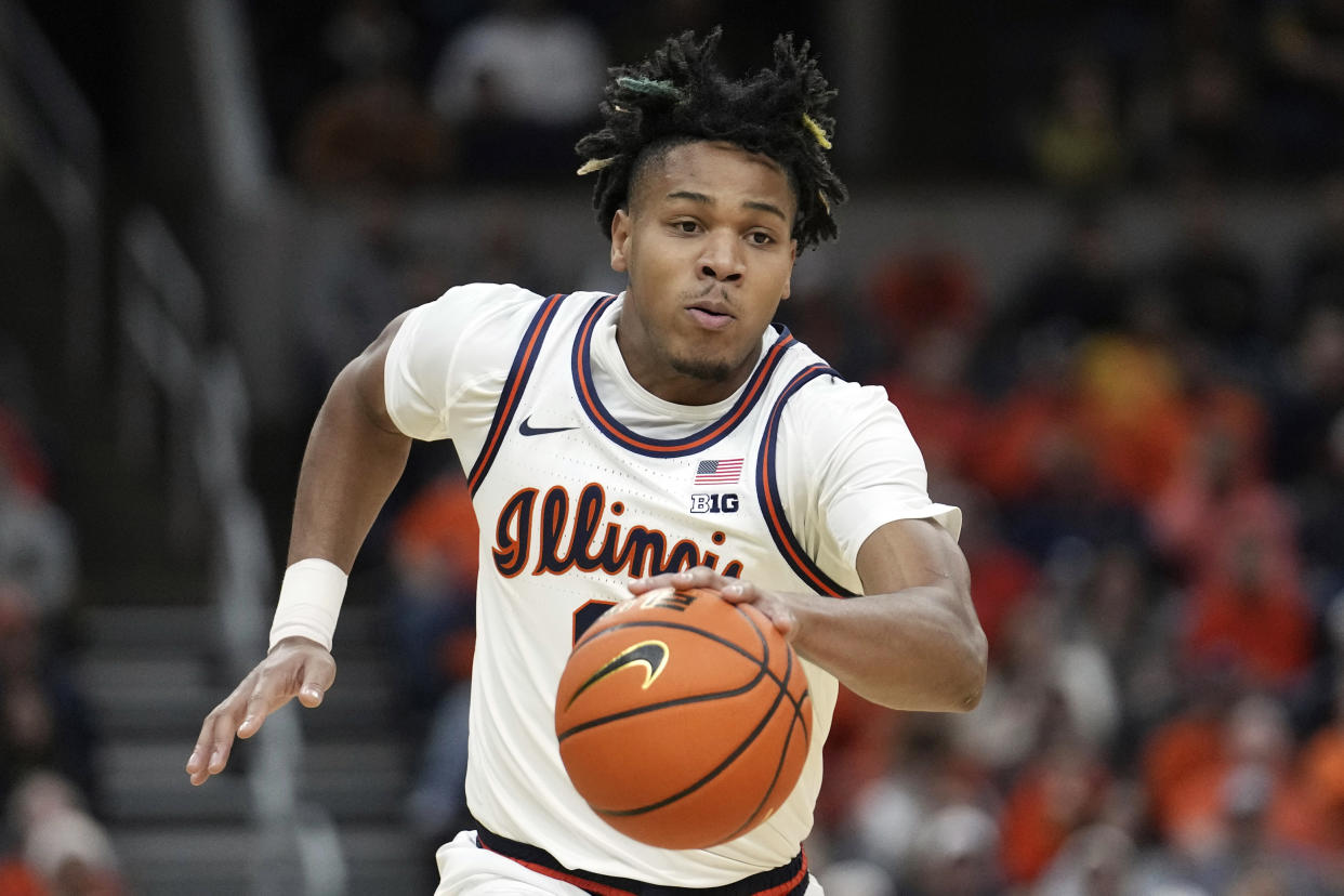 FILE - Illinois' Terrence Shannon Jr. brings the ball down the court during the first half of an NCAA college basketball game against Missouri Friday, Dec. 22, 2023, in St. Louis. Shannon filed a temporary restraining order Monday, Jan 8, 2024, against the university in an effort to be reinstated after being suspended indefinitely following a rape charge stemming from an alleged incident that happened when the football team played at Kansas in September. (AP Photo/Jeff Roberson, File)