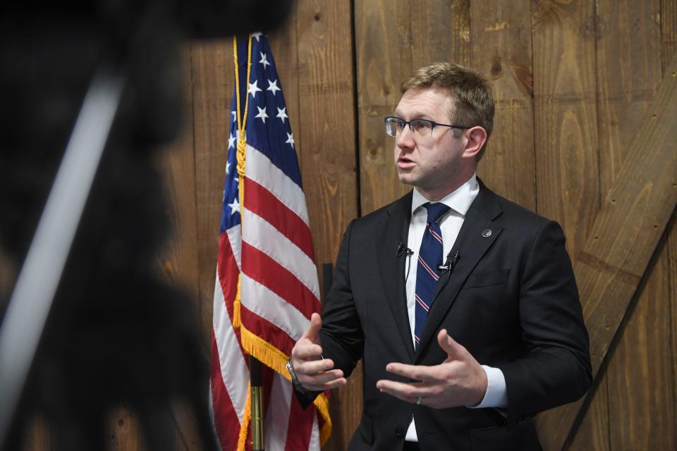 Georgia Supreme Court Justice Andrew Pinson takes questions from the media after the Columbia County Sheriff's Regional Training Center's Basic Law Enforcement Academy graduation of class 001 at the Columbia County Sheriff's Office in Appling, Ga., on Friday, March 29, 2024. This is the first class to graduate from the program.