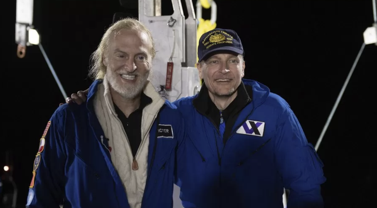 Victor Vescovo, left, and Kelly Walsh after returning from their dive to Challenger Deep in the Mariana Trench (Mike Moore / EYOS)