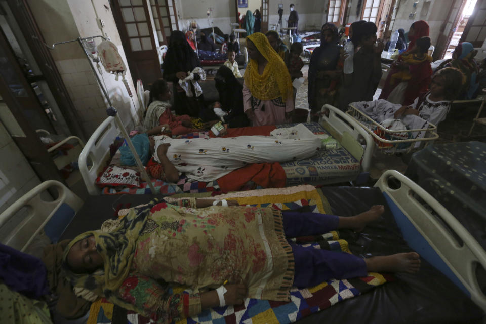 Pregnant women lie in their beds in the hospital for treatment after their flood-hit homes in Shikarpur district of Sindh Province, of Pakistan, Thursday, Sep. 1, 2022. Pakistani health officials on Thursday reported an outbreak of waterborne diseases in areas hit by recent record-breaking flooding, as authorities stepped up efforts to ensure the provision of clean drinking water to hundreds of thousands of people who lost their homes in the disaster. (AP Photo/Fareed Khan)