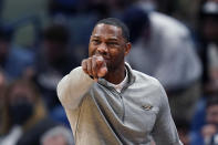 RETRANSMISSION TO CORRECT SURNAME TO GREEN - New Orleans Pelicans head coach Willie Green calls out from the bench in the second half of an NBA basketball game against the Philadelphia 76ers in New Orleans, Wednesday, Oct. 20, 2021. The 76ers won 117-97. (AP Photo/Gerald Herbert)