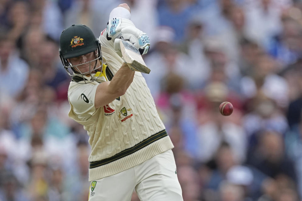 Australia's Steven Smith plays a shot during the second day of the fifth Ashes Test match between England and Australia at The Oval cricket ground in London, Friday, July 28, 2023. (AP Photo/Kirsty Wigglesworth)