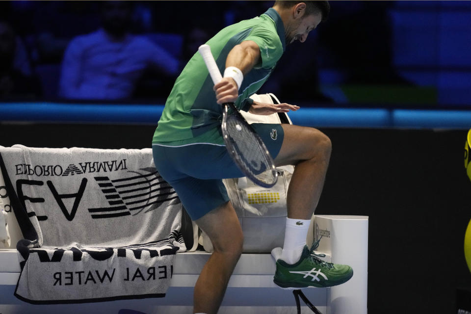 Serbia's Novak Djokovic reacts during the singles tennis match against Denmark's Holger Rune, of the ATP World Tour Finals at the Pala Alpitour, in Turin, Italy, Sunday, Nov. 12, 2023. (AP Photo/Antonio Calanni)