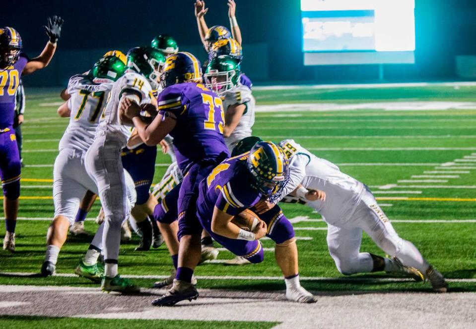 Jp Lial, 24, of Escalon High dives into the end zone for a second half touchdown. Escalon High School took on Hilmar High football during the 2021 CIF Sac-Joaquin Football Playoffs - Division V at Saint Mary’s High School in Stockton, Ca. Escalon came out on top as the champions with a 20-13 win over Hilmar.