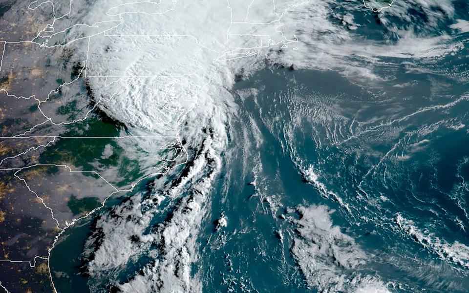 A satellite image shows Isaias off the US east coast in the Atlantic Ocean - RAMMB/NOAA/NESDIS/AFP