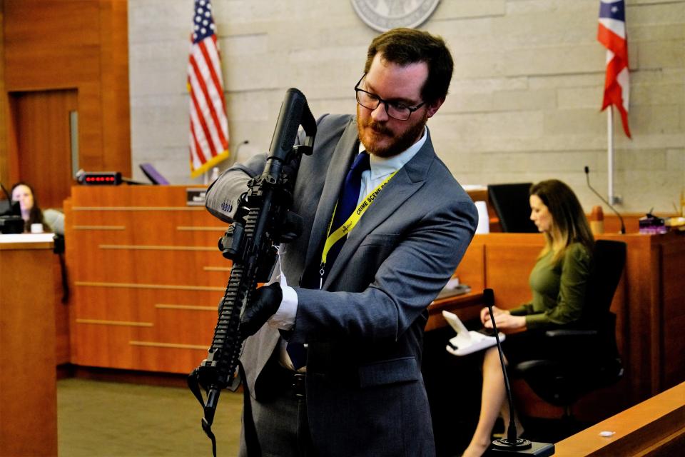 Caleb Worley, a forensic firearms analyst with the Columbus Division of Police, shows a jury on Monday, Feb. 5, 2024 in Franklin County Common Pleas Court the AR-15 style rifle ex-Franklin County Sheriff's deputy Jason Meade used on Dec. 4, 2020 when he shot 23-year-old Casey Goodson. Meade has pleaded not guilty to murder and reckless homicide.