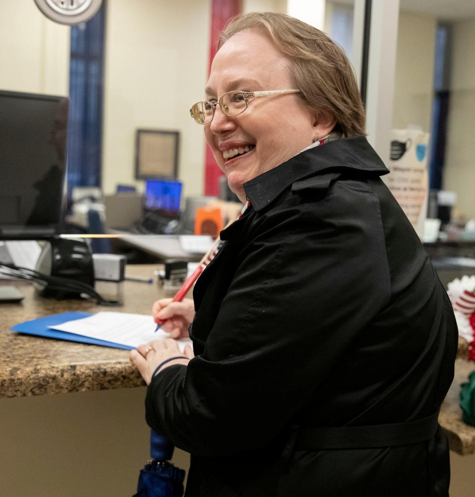 Judge Paula Skahan smiles as her colleagues as she files her petition to run for reelection Tuesday, Feb. 15, 2022, at 157 Poplar Avenue in Memphis.