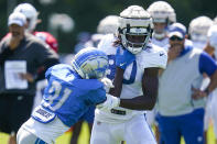 Indianapolis Colts tight end Jelani Woods (80) works against Detroit Lions safety Kerby Joseph (31) during a joint practice at NFL football training camp in Westfield, Ind., Wednesday, Aug. 17, 2022. (AP Photo/Michael Conroy)