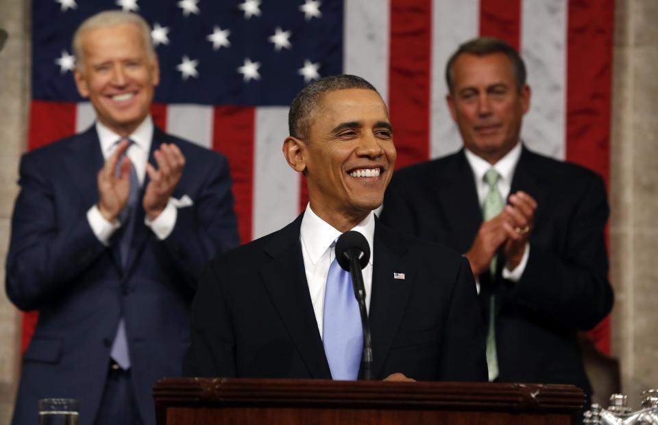 President Barack Obama delivers the State of Union address before a joint session of Congress in the House chamber Tuesday, Jan. 28, 2014, in Washington, as Vice President Joe Biden, and House Speaker John Boehner of Ohio, applaud. (AP Photo/Larry Downing, Pool)