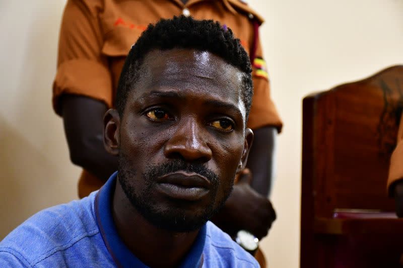 Ugandan presidential candidate Robert Kyagulanyi also known as Bobi Wine sits inside the courtroom in Iganga