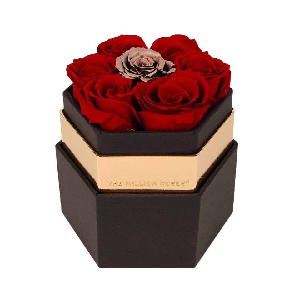 <p><a href="https://go.redirectingat.com?id=74968X1596630&url=https%3A%2F%2Fthemillionroses.com%2Fcollections%2Fred-roses%2Fproducts%2Fone-in-a-million-black-hexagon-box-with-red-and-rose-gold-roses&sref=https%3A%2F%2Fwww.elle.com%2Ffashion%2Fshopping%2Fg42388033%2Fbest-gifts-for-wife%2F" rel="nofollow noopener" target="_blank" data-ylk="slk:Shop Now;elm:context_link;itc:0;sec:content-canvas" class="link ">Shop Now</a></p><p>One in a Million™ Black Hexagon Box</p><p>$149.00</p><p>themillionroses.com</p>