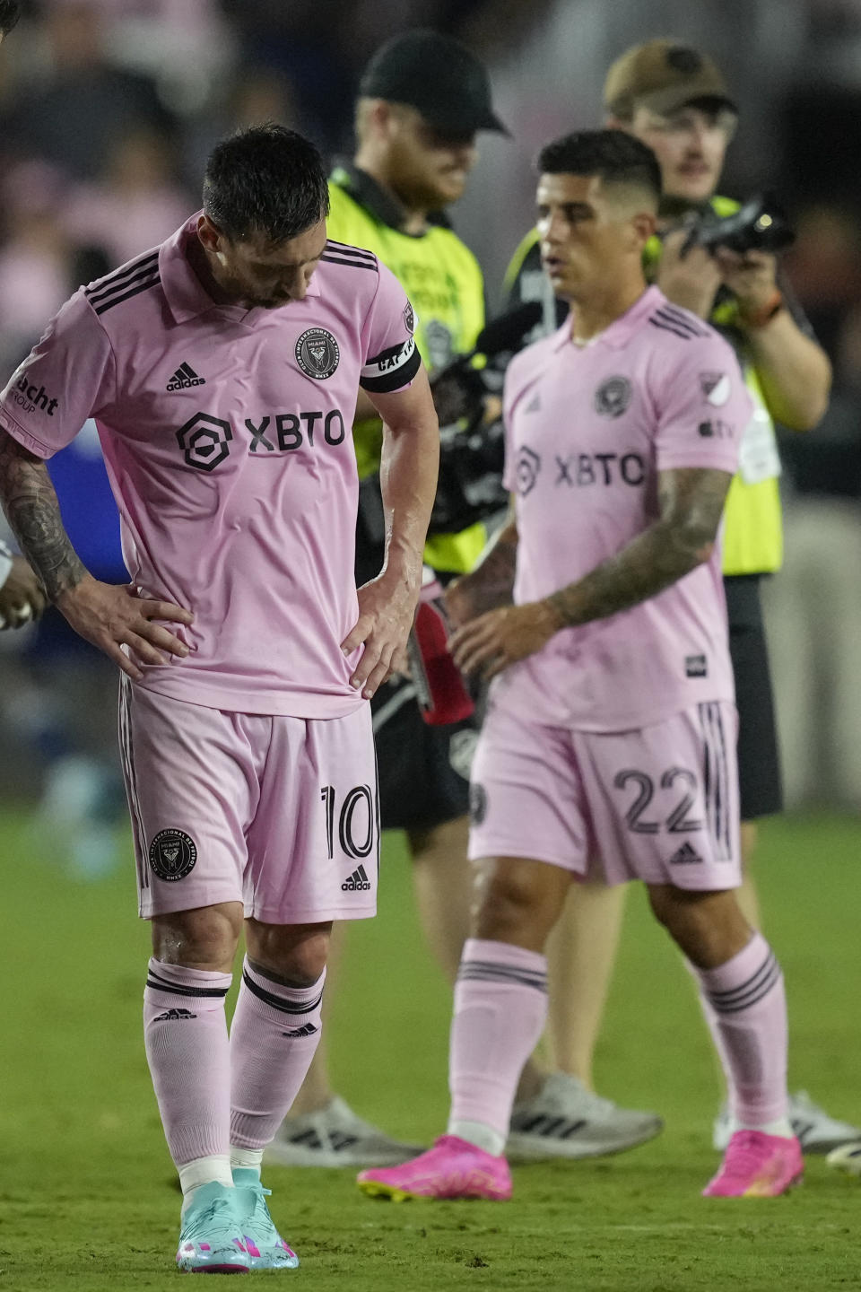 Inter Miami forward Lionel Messi (10) and forward Nicolás Stefanelli (22) react after losing 1-0 to FC Cincinnati in their MLS soccer match, Saturday, Oct. 7, 2023, in Fort Lauderdale, Fla. (AP Photo/Rebecca Blackwell)