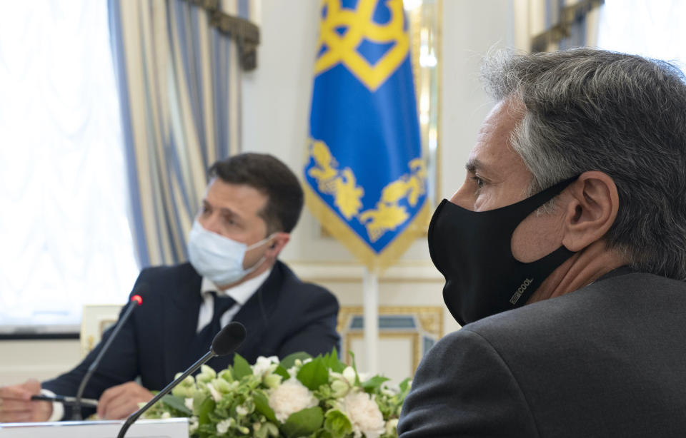 In this photo released by the Ukrainian Presidential Press Office, Ukrainian President Volodymyr Zelenskyy, left, and U.S. Secretary of State Antony Blinken, right, attend the during their meeting talks in Kyiv, Ukraine, Thursday, May 6, 2021. Secretary of State Antony Blinken has met with top Ukrainian officials in Kyiv and reaffirmed Washington's support for the country in the wake of heightened tensions with Russia, fueled by its recent troop buildup. (Ukrainian Presidential Press Office via AP)