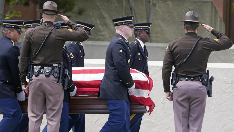 Members of the Utah Army National Guard carry the casket of former Utah Sen. Orrin Hatch's during funeral services at The Church of Jesus Christ of Latter-day Saints' Institute of Religion Friday, May 6, 2022, in Salt Lake City. Hatch, the longest-serving Republican senator in history and a fixture in Utah politics for more than four decades, died last month at the age of 88. (AP Photo/Rick Bowmer)