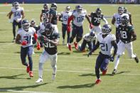 Jacksonville Jaguars running back James Robinson (30) scores a touchdown on a 17-yard run against the Tennessee Titans in the second half of an NFL football game Sunday, Sept. 20, 2020, in Nashville, Tenn. (AP Photo/Wade Payne)