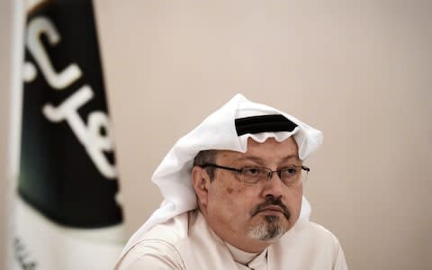 Jamal Khashoggi at a press conference in 2014 - Credit: MOHAMMED AL-SHAIKH/AFP