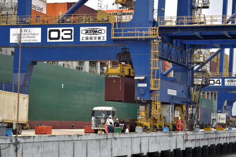 Containers are being transported at the port terminal, in Guayaquil