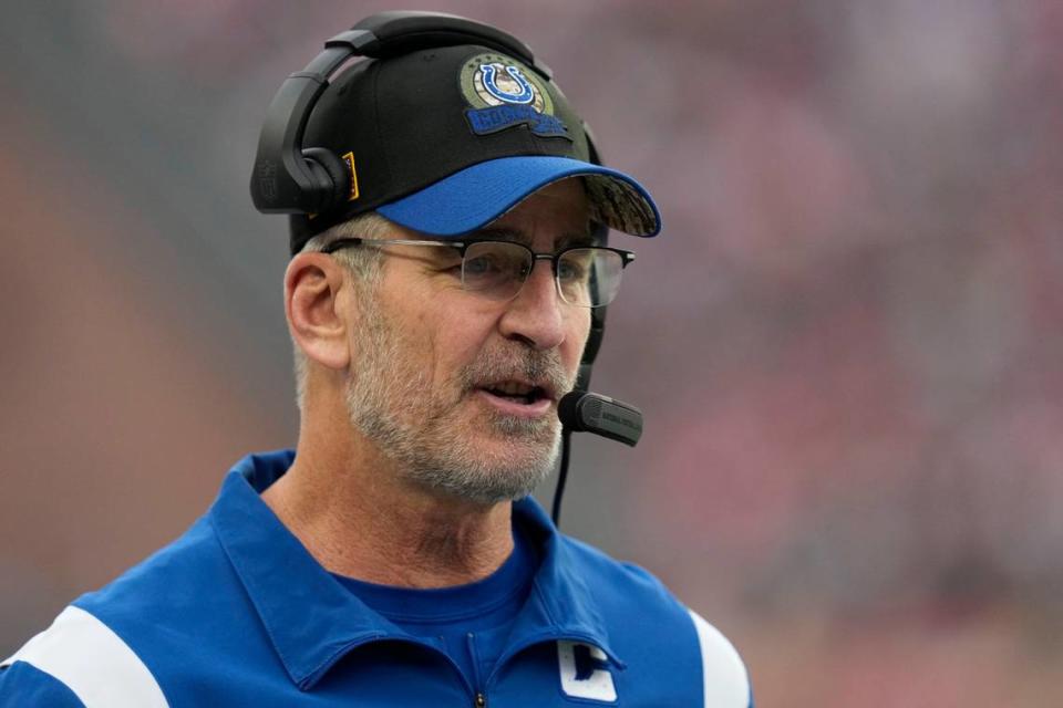 Indianapolis Colts head coach Frank Reich stands on the sideline in the first half of an NFL football game against the New England Patriots, Sunday, Nov. 6, 2022, in Foxborough, Mass. (AP Photo/Charles Krupa)