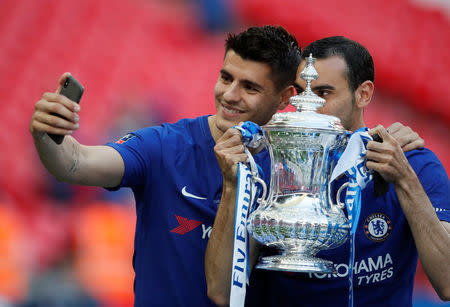 Soccer Football - FA Cup Final - Chelsea vs Manchester United - Wembley Stadium, London, Britain - May 19, 2018 Chelsea's Alvaro Morata and Davide Zappacosta take a selfie as they celebrate winning the final with the trophy REUTERS/David Klein