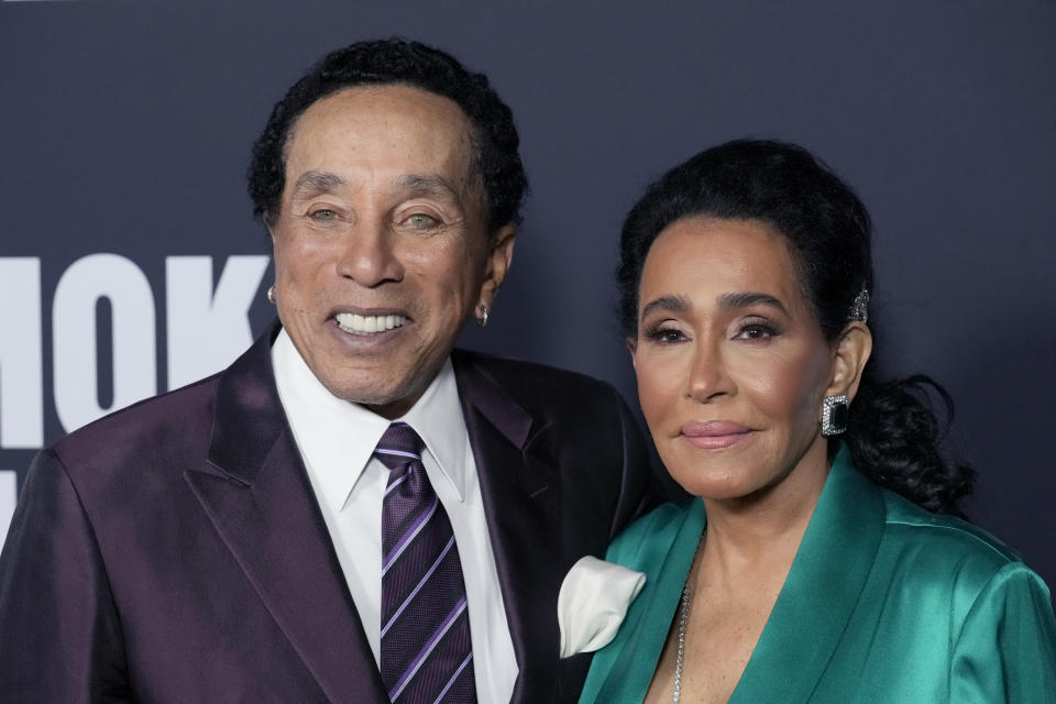 Smokey Robinson, left, and Frances Glandney arrive at MusiCares Person of the Year, a celebration in his honor, at the Los Angeles Convention Center on Friday, Feb. 3, 2023. (AP Photo/Chris Pizzello)