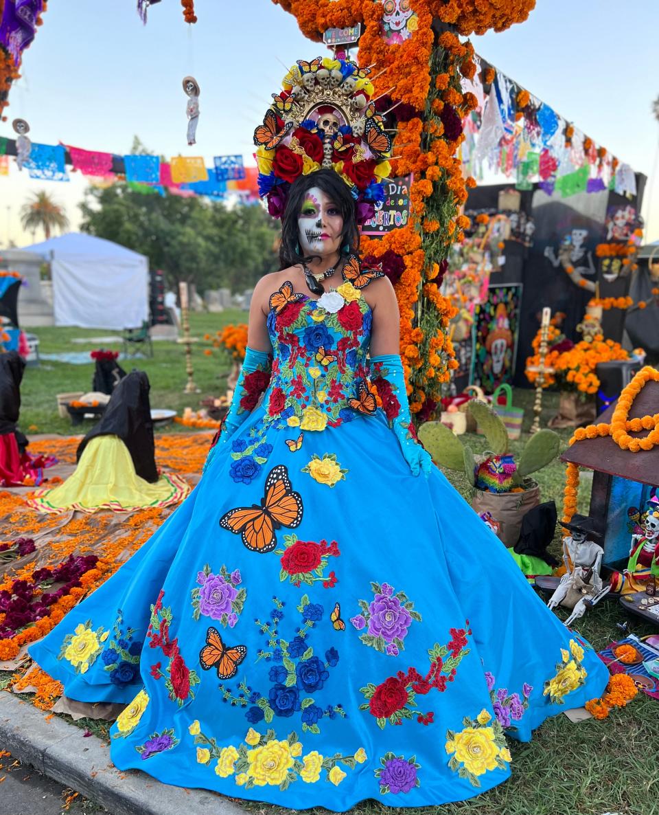Eliea Hernandez of Anaheim poses during the Día de Los Muertos celebration at the Hollywood Forever Cemetery in Los Angeles on Saturday, Oct. 28, 2023.