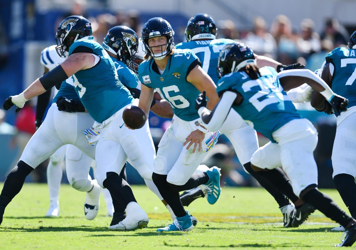 Jacksonville Jaguars quarterback Trevor Lawrence (16) rolls out to scramble during fourth quarter action. The Jacksonville Jaguars hosted the Indianapolis Colts at EverBank Stadium in Jacksonville, FL Sunday, October 15, 2023. The Jaguars ended the first half with a 21 to 6 lead and won with a final score of 37 to 20.