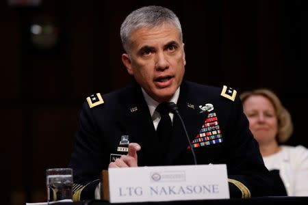 FILE PHOTO - Lieutenant General Paul Nakasone, nominee to lead the National Security Agency and US Cyber Command, testifies before the Senate Intelligence Committee on Capitol Hill in Washington, U.S., March 15, 2018. REUTERS/Aaron P. Bernstein