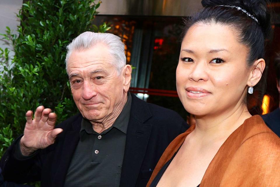 <p>Dimitrios Kambouris/WireImage</p> Robert De Niro (left) and Tiffany Chen on June 10