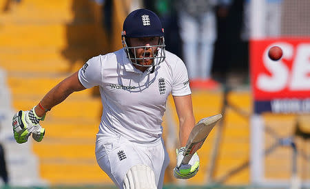 Cricket - India v England - Third Test cricket match - Punjab Cricket Association Stadium, Mohali, India - 26/11/16. England's Jonny Bairstow reacts after playing a shot. REUTERS/Adnan Abidi