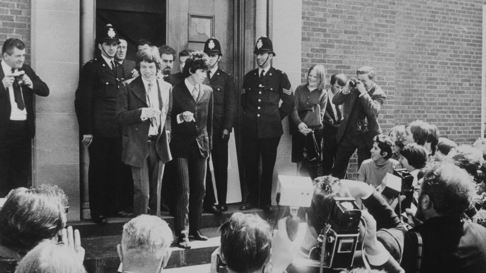 mick jagger and keith richards from the rolling stones photographed leaving magistrates court in sussex, 10th may 1967