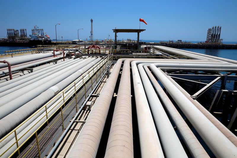 An oil tanker is being loaded at Saudi Aramco's Ras Tanura oil refinery and oil terminal in Saudi Arabia