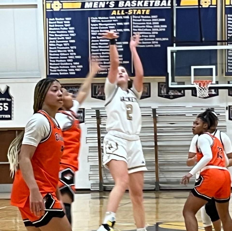 Birmingham Detroit Country Day guard Cece Arico takes a jump shot on Thursday, Jan. 25 against Belleville at Detroit Country Day.