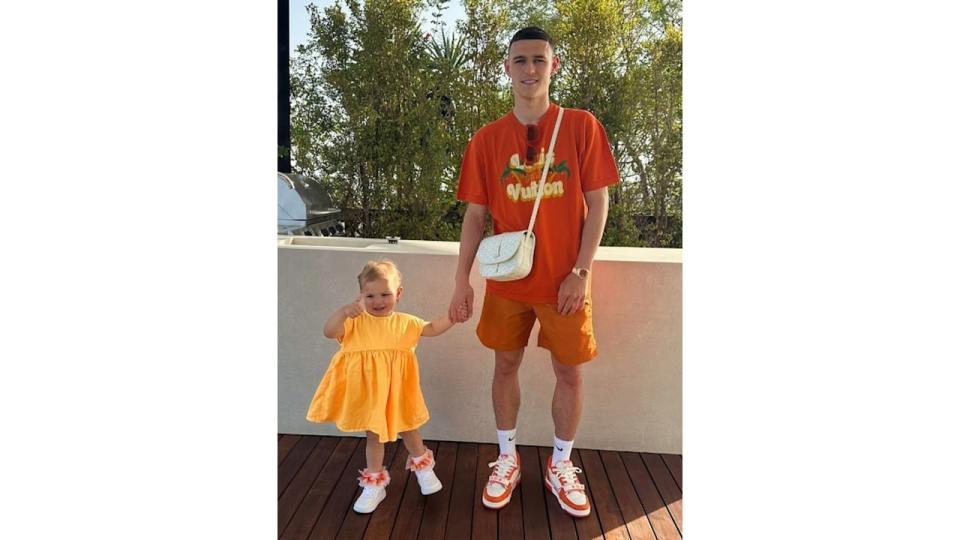 Phil Foden with his daughter