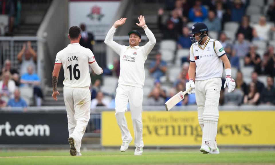 Jos Buttler congratulates Jordan Clark on removing Joe Root, but Lancashire’s joy was shortlived