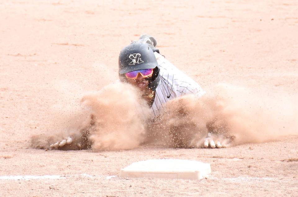 Herkimer College General Jovani Wiggs dives into third base at Veterans Memorial Park Saturday after breaking a scoreless sixth-inning tie with a bases-loaded triple against Rowan College of South Jersey-Gloucester.