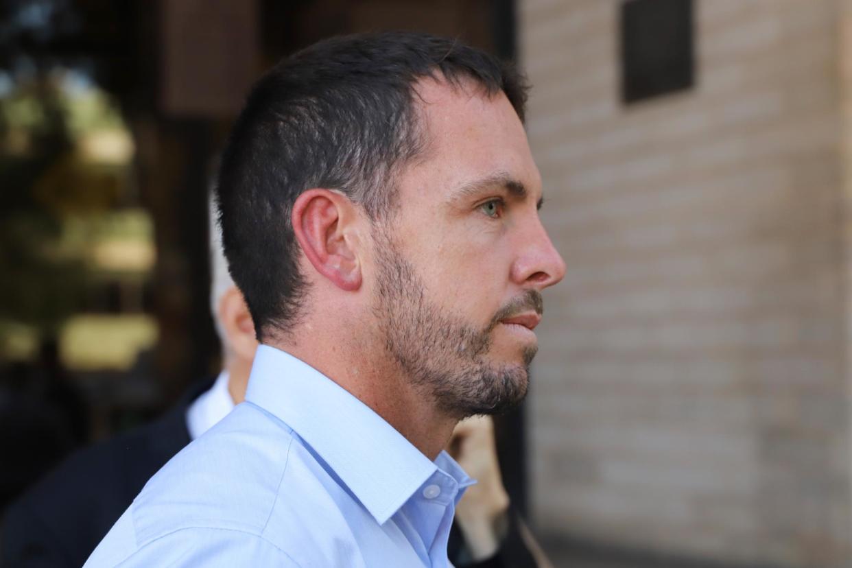 <span>Zachary Rolfe departs the inquest into the death of Kumanjayi Walker. The NT police commissioner, Michael Murphy, says the force is investigating Rolfe’s evidence regarding racism. </span><span>Photograph: Rudi Maxwell/AAP</span>