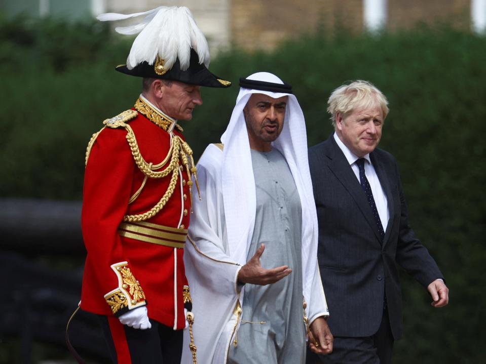 The PM is pictured with the Crown Prince of Abu Dhabi inspecting the Guard of Honour in central London (POOL/AFP via Getty Images)