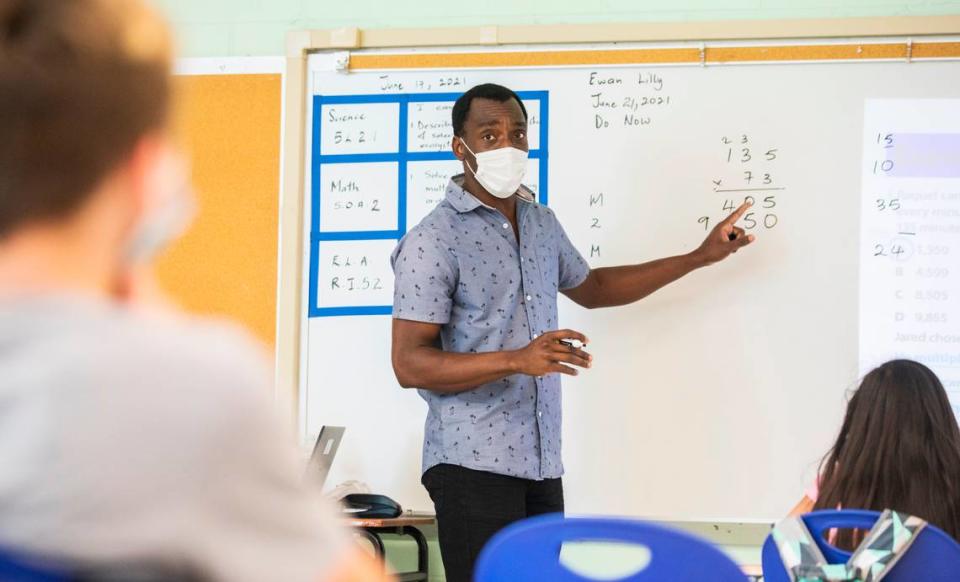 Ewan Lilly, a fifth grade teacher at Eno Valley Elementary School in Durham, N.C., conducts a math lesson during the “Camp Eno Valley” summer learning program on Monday, June 21, 2021.