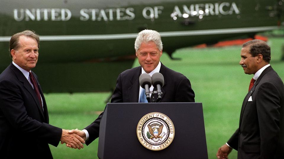 Took office: July 1, 1997 (acting)  Left office: Jan. 2, 1998  Took office: July 25, 2000 (acting)  Left office: Jan. 20, 2001   U.S. President Bill Clinton (C) shakes hands with incoming Veteran's Affairs Secretary Hershel W. Gober (L) as outgoing Veteran's Affairs Secretary Togo West Jr. (R) moves into the picture during a press conference 10 July, 2000 on the South Lawn at the White House in Washington, D.C. (GEORGE BRIDGES/AFP/Getty Images)