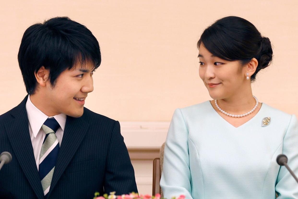 Mandatory Credit: Photo by Shizuo Kambayashi/AP/Shutterstock (13484511a) Japan's Princess Mako and her fiance Kei Komuro look at each other during a press conference at Akasaka East Residence in Tokyo on . Komuro has passed the New York bar exam, defying detractors back home who had criticized their romance Former Princess, Tokyo, Japan - 03 Sep 2017