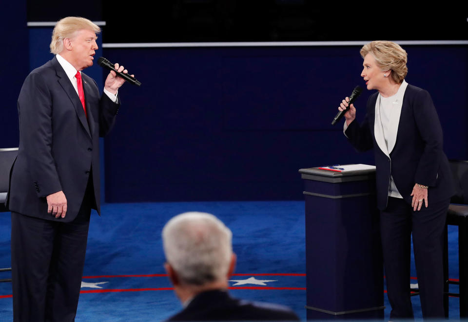 <p>Republican presidential nominee Donald Trump and Democratic U.S. presidential nominee Hillary Clinton speak during their presidential town hall debate at Washington University in St. Louis, Mo., Oct. 9, 2016. (Photo: Jim Young/Reuters) </p>