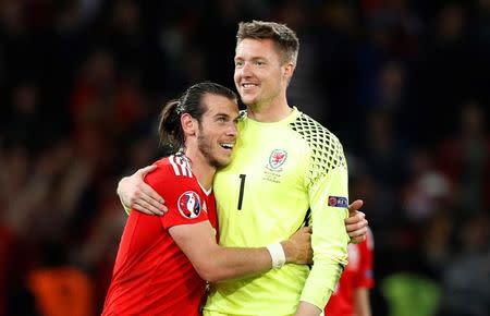 Football Soccer - Wales v Belgium - EURO 2016 - Quarter Final - Stade Pierre-Mauroy, Lille, France - 1/7/16 Wales' Gareth Bale and Wayne Hennessey celebrate at the end of the game REUTERS/Darren Staples Livepic