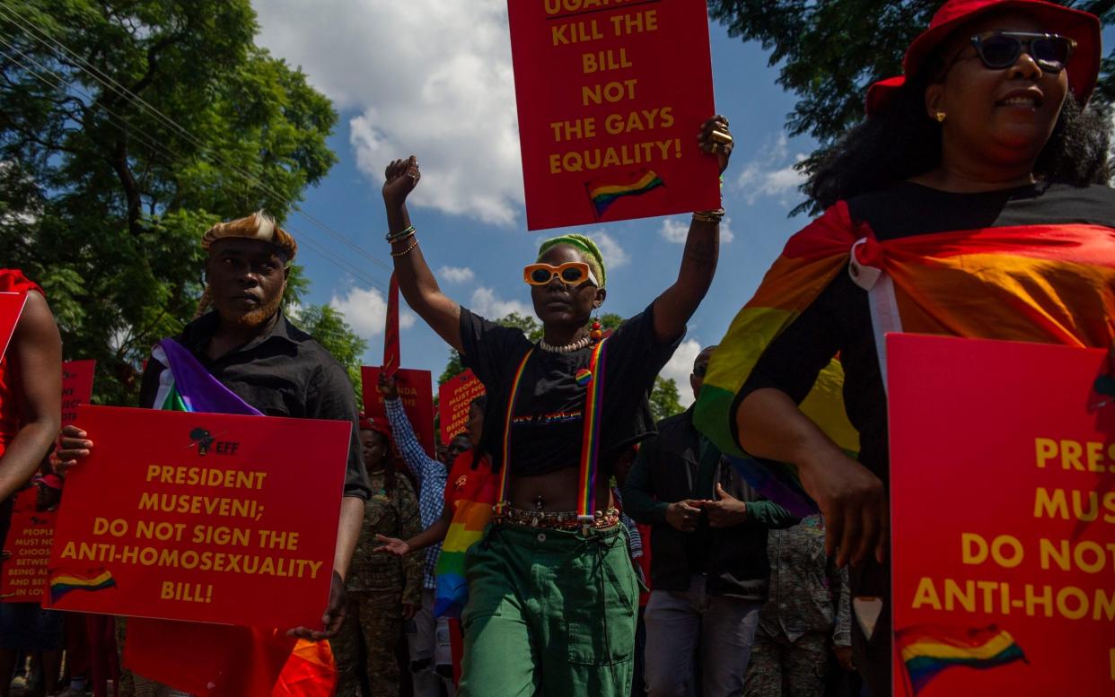 Ugandan activists in Pretoria, South Africa, protesting against the controversial bill - Getty 